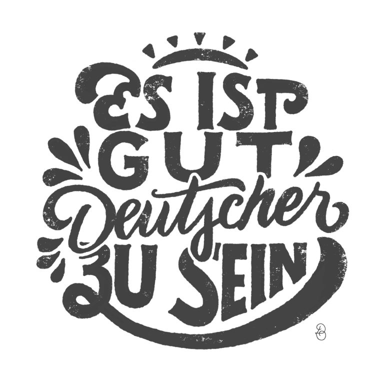 Handlettering in Anthrazit "Es ist gut Deutscher zu sein" mit weißem Hintergrund